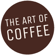 לוגו עגול בצבע חום, שבו מופיע הכיתוב "THE ART OF COFFEE" באותיות גדולות ולבנות, הממוקם במרכז המעגל, מעורר תחושה של ארומה ומרמז על החוויה של לגימת כוס קפה מושלמת. | אספרסימו