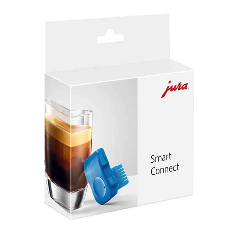 קופסת מוצר שעליה הכיתוב "מתאם בלוטות' Jura - Smart Connect", ובה מופיעים בחזית המכשיר הכחול וכוס אספרסו, המדגישים את הארומה העשירה ואת הטעם של כוס קפה מושלמת. | אספרסימו