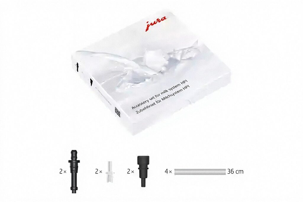 ערכת אביזרים למערכות חלב למכונת הקפה JURA מדגם HP1, הכוללת מחברים, צינורות ודסות — המושלמים לשדרוג הארומה של המשקה שלכם באמצעות מכונת הקפה שלכם. האריזה מעוצבת עם סמל של סילון חלב ולוגו JURA אדום, כאשר כמות הפריטים מצוינת על גבי הקופסה. | אספרסימו