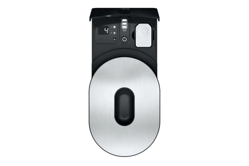 מבט מלמעלה על מקרר החלב Cool Control, בנפח 0.6 ליטר בצבע שחור, המיועד למכונות הקפה של JURA. | אספרסימו
